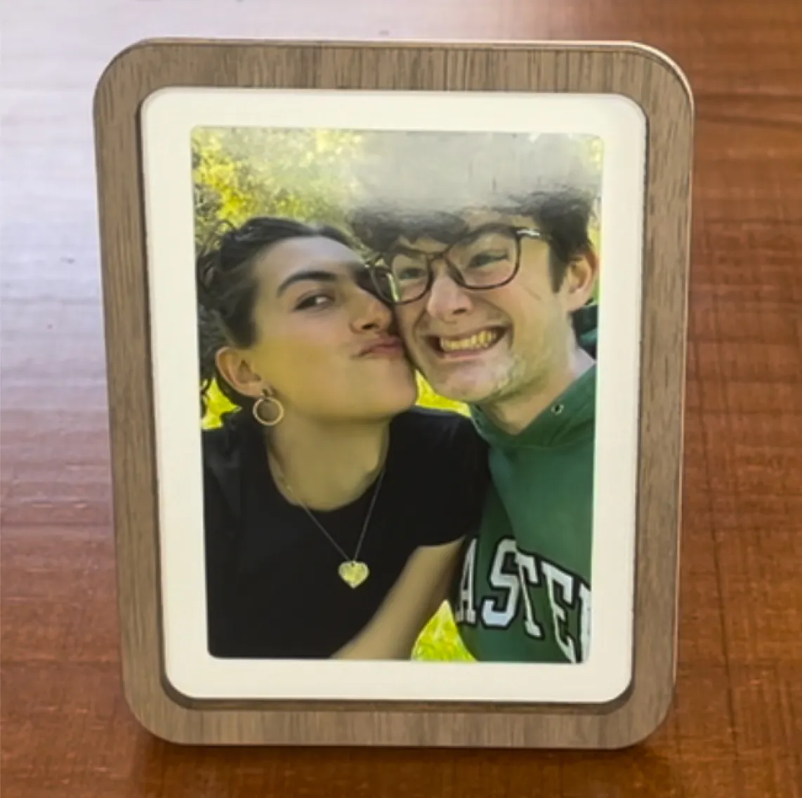 Pop-up Frame with a close-up photo of a couple